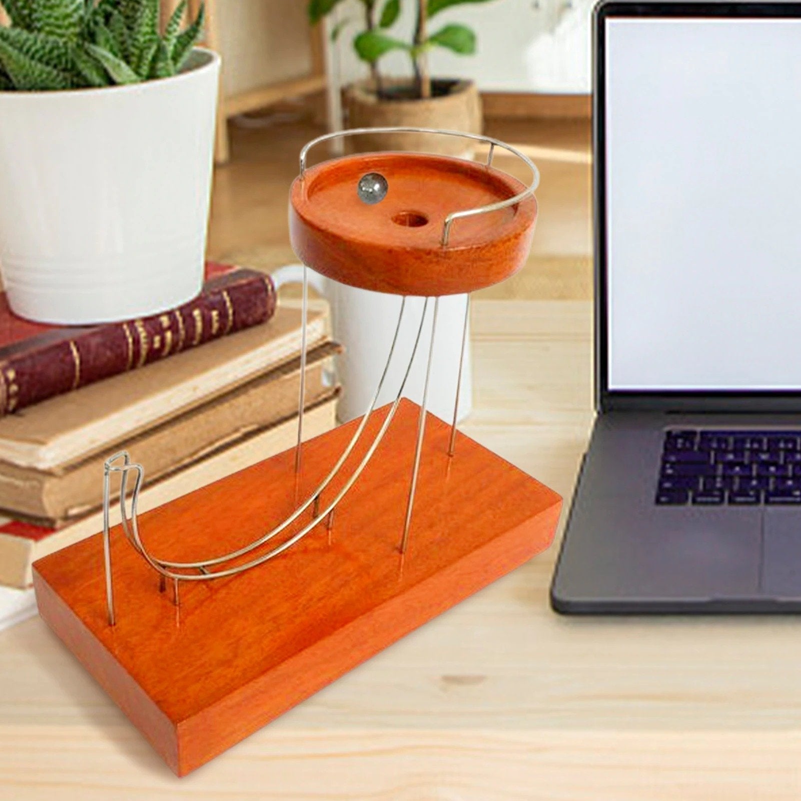 MomentumArt™ | Erleben Sie die Ruhe endloser kinetischer Bewegung